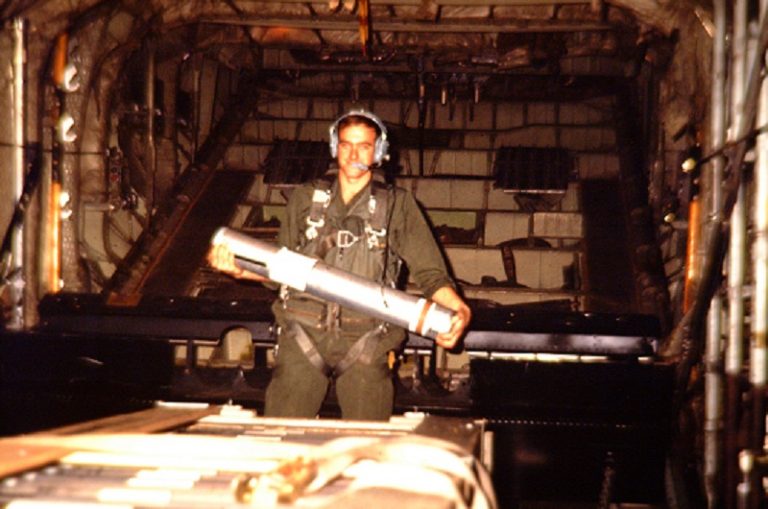 US soldier in Vietnam holding a flare tube