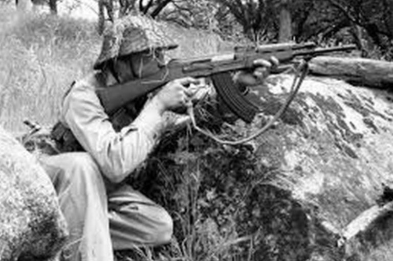 a Vietnamese soldier with an AK