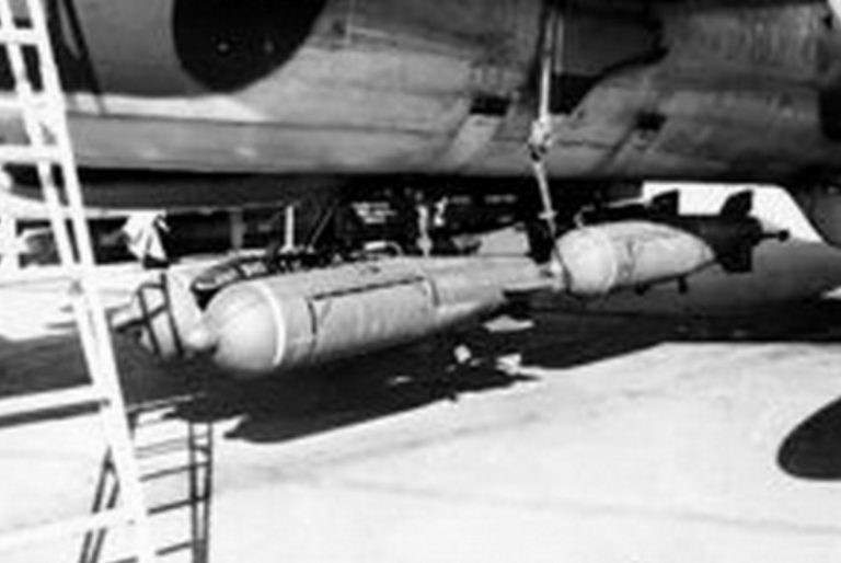 cluster bombs attached to a bomber
