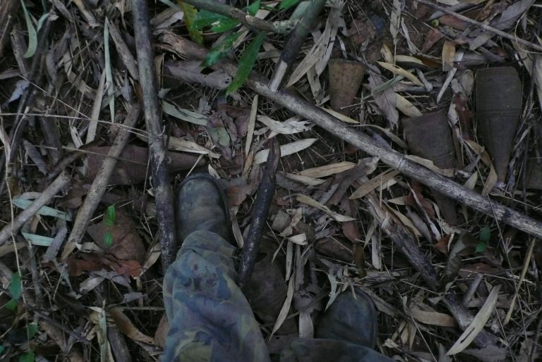 discarded explosive shells litter parts of the Ho Chi Minh Trail