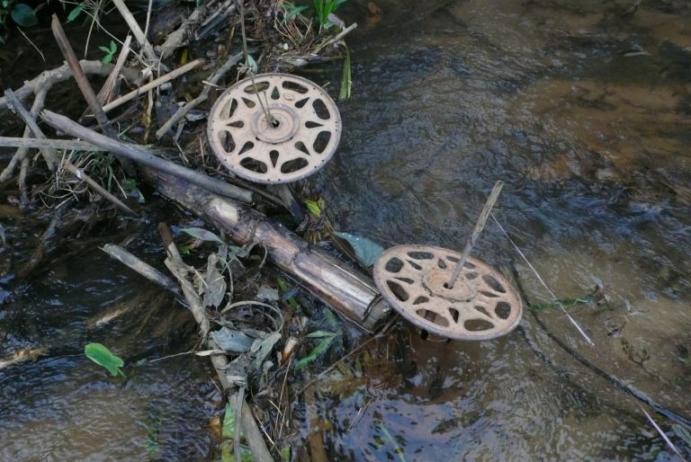 discarded wire reels north of Ban Bak