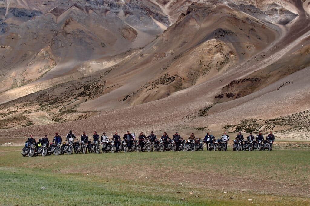 Explore Indochina group photo in Sarchu during a motorbike tour of the Himalayas in India
