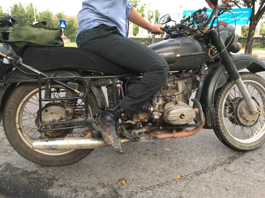one of the BBC No Limits cast members on his motorcycle