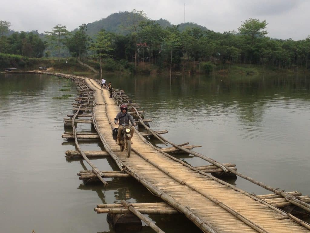 riding a rickety bridge near Pu Luong