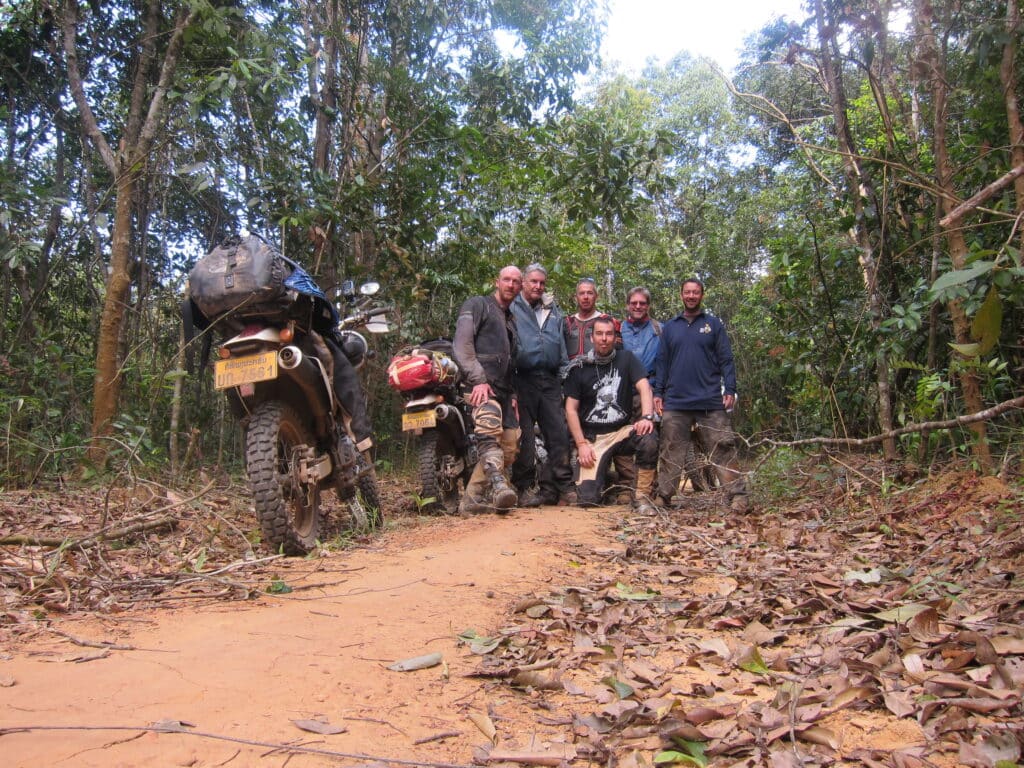 Explore Indochina riders deep in the Laotian jungle on a Ho Chi Minh Trail motorcycle tour