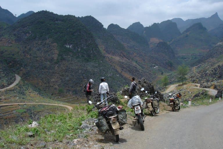 Explore Indochina riders taking a rest in Ha Giang