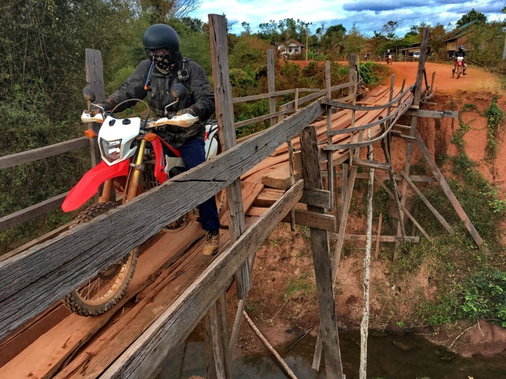 a bad bridge on the Ho Chi Minh Trail motorbike tour in Laos