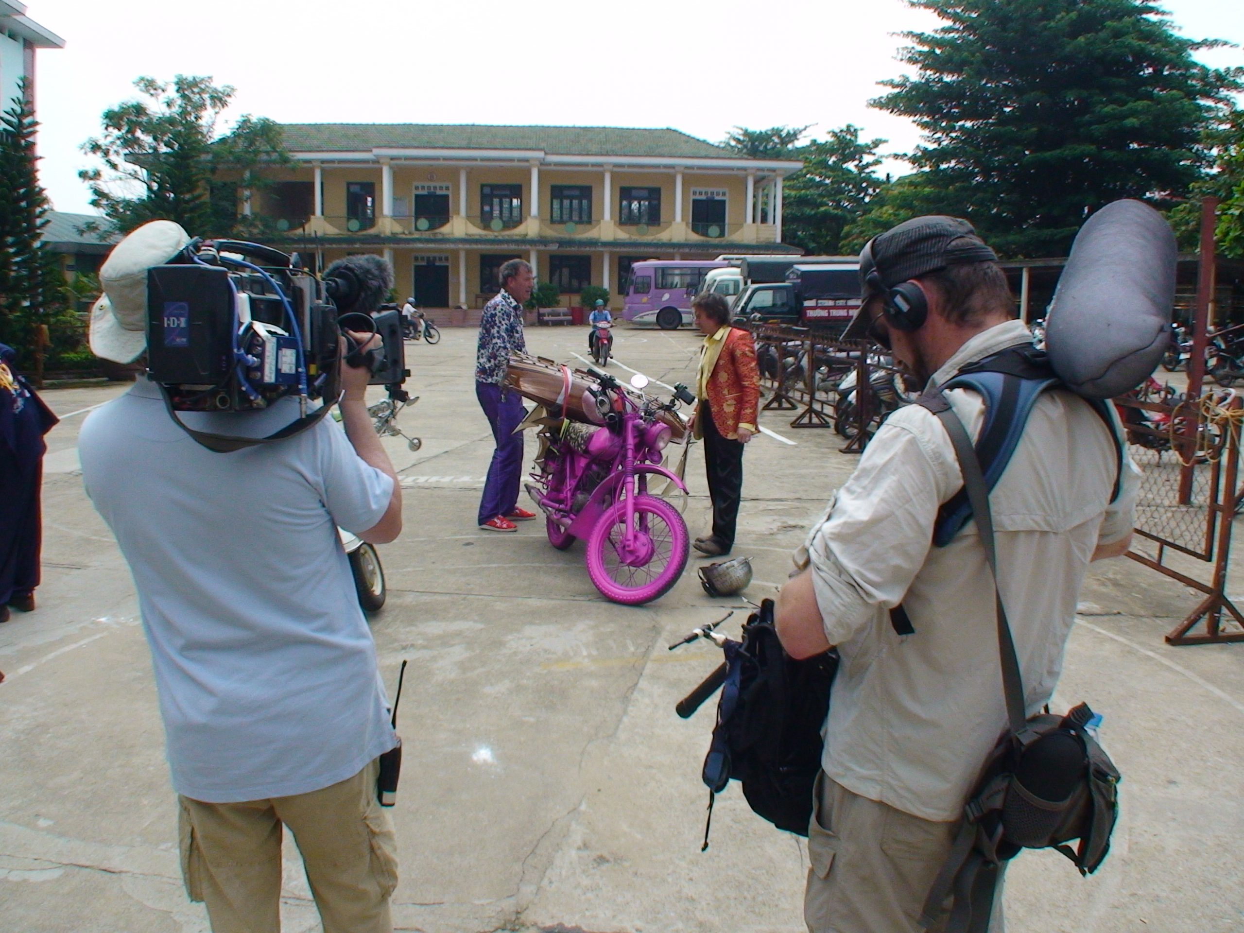 Filming the scene where the presenters get their Vietnamese motorycle licenses