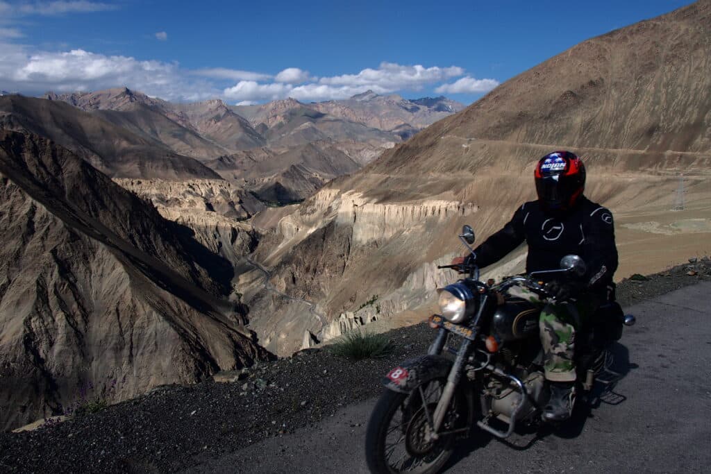 Riding above Lamayuru while enjoying a motorcycle tour of the Himalayas in India