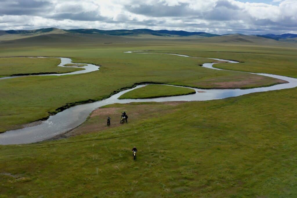 Explore Indochina riders enjoying a morning ride near Zuun Nuur Lake Mongolia