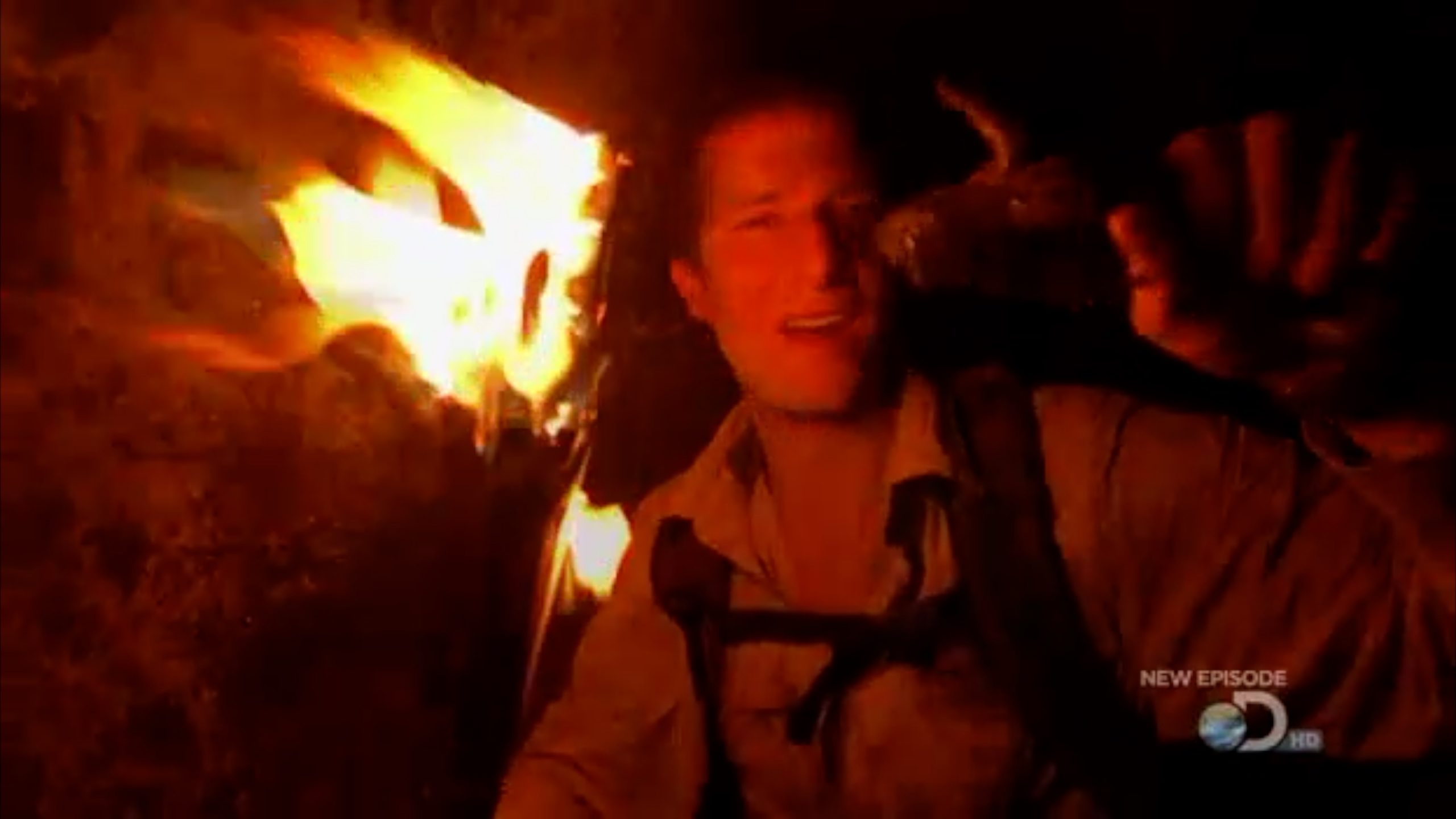 Bear Grylls eating a common toad raw