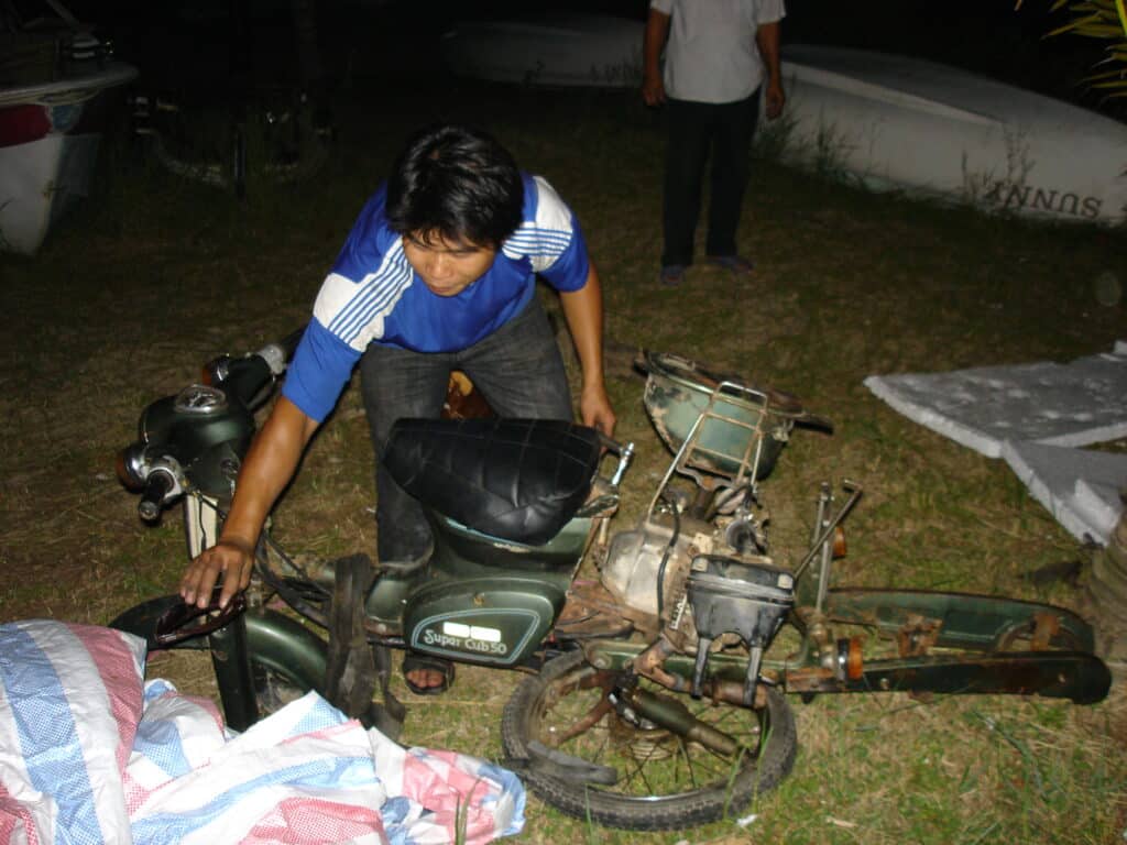 Last minute preparations made to James Mays Honda Cub boat for Top Gear's Vietnam Special